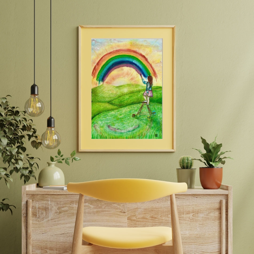 Der farbenfrohe Kunstdruck „Regenbogenfarben“ von Nathalie-Designs zeigt ein Mädchen auf einer Leiter, das einen Regenbogen über eine sonnige Wiese malt. Verträumte Wandkunst und liebevolle Wanddekoration für Wohnzimmer, Kinderzimmer oder Atelier.